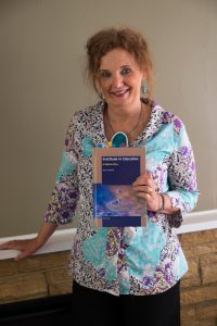 Portrait of Kerry Howells, author and academic
