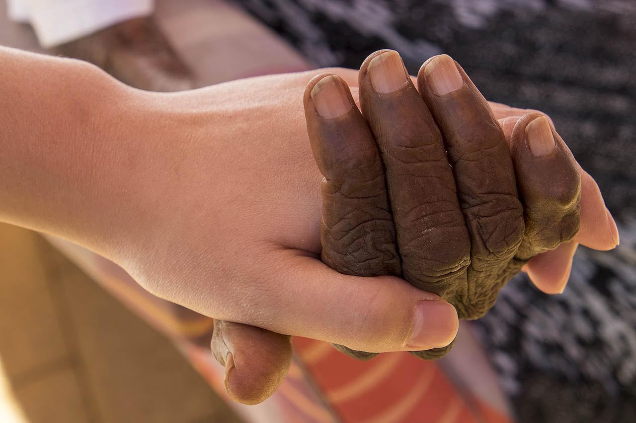 Caring hands at the Hetti Perkins Home for the Aged in Alice Springs. The Hetti Perkins Home is an aged care facility for indigenous Australians. Almost 90% of the patients are sufferers of dementia.
